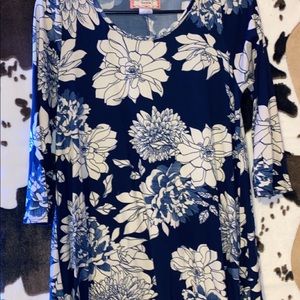 Blue long sleeve dress with white flowers.